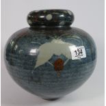 Large Studio Pottery Vase by Margaret & David Frith: decorated with leaves in marble effect glaze,