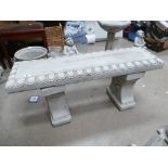 Garden Ornament in the form of garden bench with fluer de lis decoration,