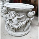 Garden Ornament in the form of large planter decorated with cherubs ,