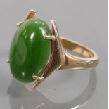 9ct gold ring set with oval jade stone, size K, 4.5 grams.