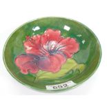 Moorcroft dish in the Hibiscus pattern: Measures 14.5cm wide.