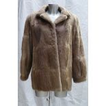 A Musquash fur ladies Jacket: Size 12.