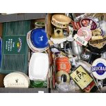 A collection of Pub related items to include: ashtrays, pump badges, decanters etc (2 trays )