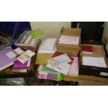 A large quantity of card making cardboard: to include gold, white, metalic etc