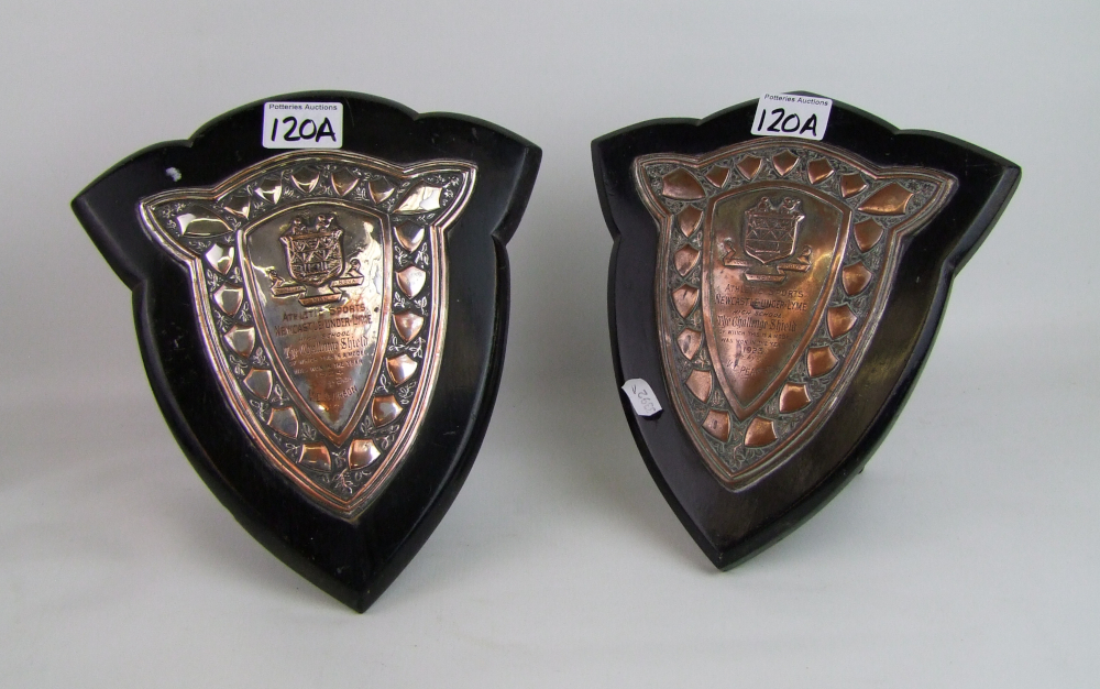 Two 1920s Newcastle under Lyme Athlectics trophy plaques: together with A collection of African