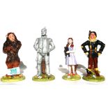 Royal Doulton Set of Wizard of Oz figures: Including Tin Man, Lion, Dorothy & Scarecrow. Limited