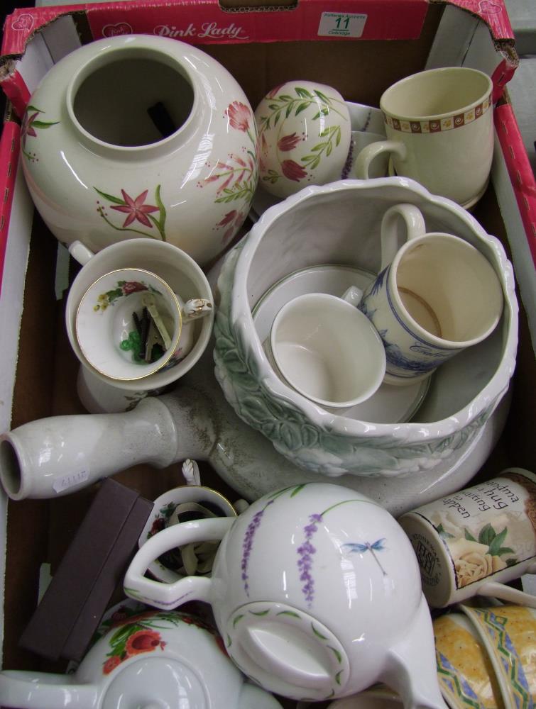 A mixed collection of items to include: floral decorated teapots, tea for one sets, floral decorated