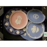 A collection of Wedgwood Jasperware plates including : tri colour and commemorative items