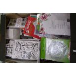 A quantity of card making equipment: to include tonic studios strip stamp sets, die sets etc (1