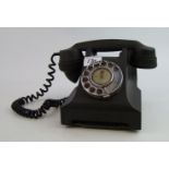 A vintage bakelite telephone: