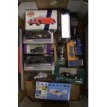 A collecttion of Corgi, Dinky & similar boxed model cars and trucks: