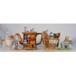 A mixed collection of figures to include: Disney Showcase Pooh Teapot similar Captian Pooh