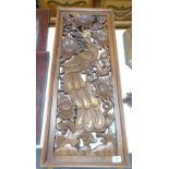 Carved wooden panel: with images of birds of paradise and foliage