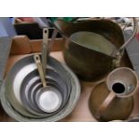 A mixed collection of metal ware to include:coal scuttle, graduated pan set, quart jug etc