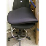 A tall office/computer swivel chair.