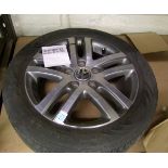 A VW alloy wheel and tyre: 205/55 R16.
