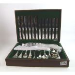 A cased stainless steel ornate cutlery set: