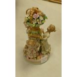 20th century ceramic Continental style figures: of larger girls around floral garden ornament