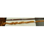 Carved walking staff with cobra decoration: together with carved bow