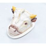 A 20th Century ceramic tongue dish: inform of bulls head. height 20cm