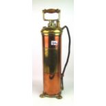 A brass and copper fire extinguisher (58cm in height):