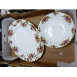 A collection of Royal Albert Old Country Roses pottery: including veg dish and large platters,