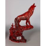 Anita Harris Flambe Wolf on rock figure: silver signed to the base.