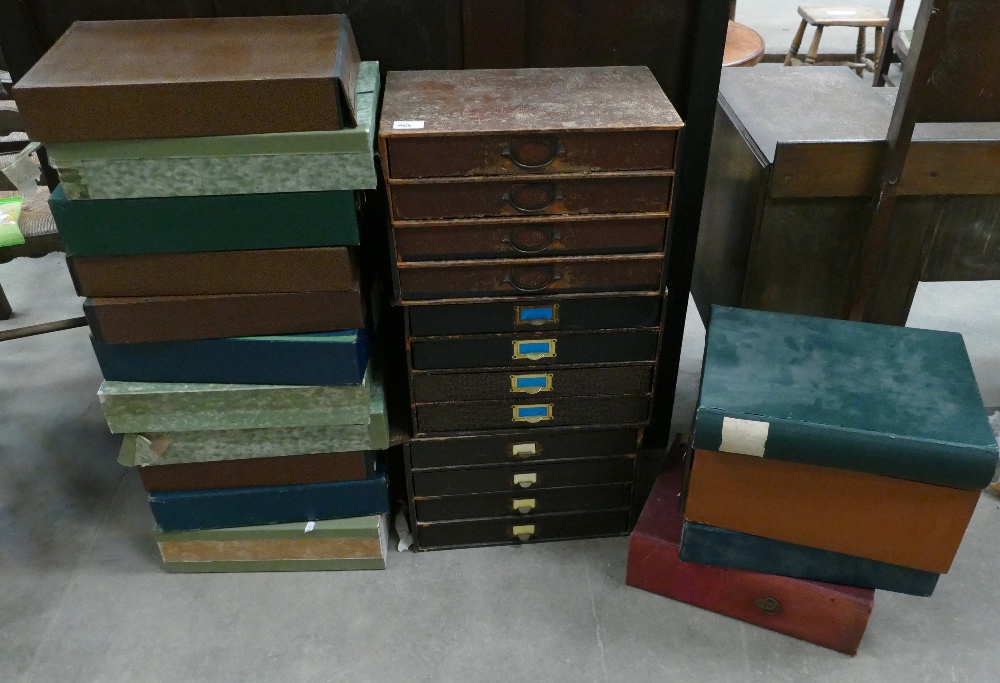 A collection of cardboard type drawers: and filing sleeves in various states a repair