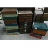 A collection of cardboard type drawers: and filing sleeves in various states a repair