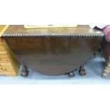 Carved Mahogany 1920's Drop Leaf Table: with rope edge and ball and claw feet,