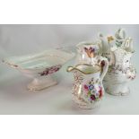 A collection of 19th Century Floral embossed pottery: to include jugs and comport,