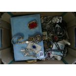 A mixed collections of costume jewelry items to include: brooches, watches , boxes,