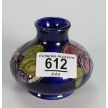 Moorcroft small vase decorated in the clematis design: height 8cm.
