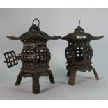 A pair of cast metal garden candle holders: x 2