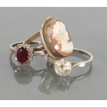 Silver vintage ladies rings: one set with cameo and other two stone set.