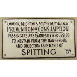 A reproduction spitting railway metal sign: length 29cm