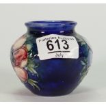 Moorcroft small vase decorated in the anemone design: height 7.25cm.