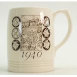 A Wedgwood Keith Murray mug: Featuring two landscape views in sepia,