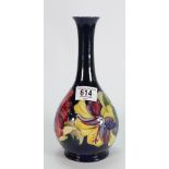 Walter Moorcroft vase decorated in the hibiscus design: height 25cm.