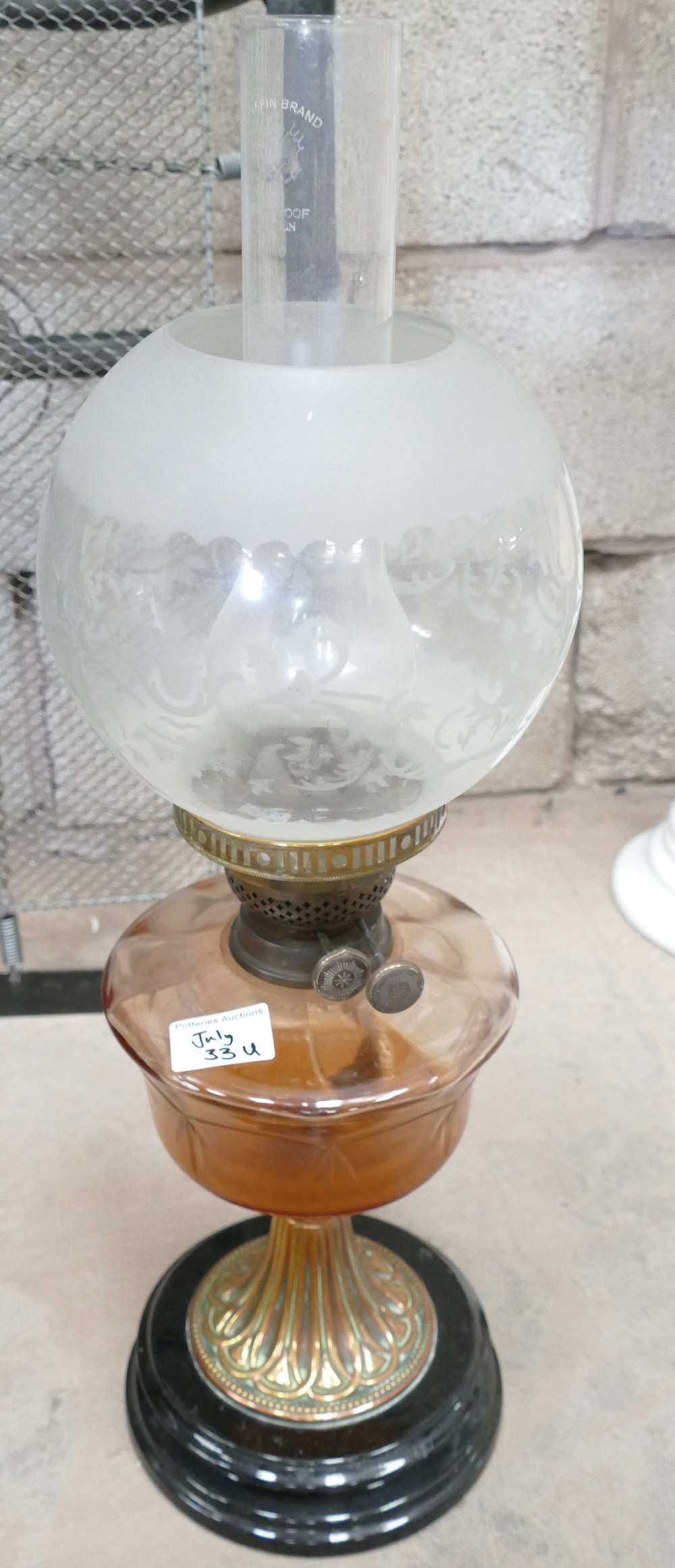 Brass and glass Victorian oil lamp: with chimney and shade