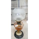 Brass and glass Victorian oil lamp: with chimney and shade