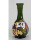 Moorcroft small vase decorated in the hibiscus design: height 16cm.