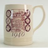 A Wedgwood Keith Murray Mug: Featuring two landscape views in puce, by Victor Skellern of Barlaston,