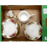 Royal Albert Old Country Roses items: including two different shaped bowls and a small teapot.