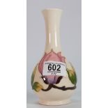 Moorcroft small vase decorated in the magnolia design: height 16cm.
