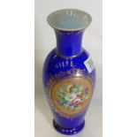 Blue glass vase: hand decorated with flowers and gild decorations. Height 28cm