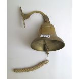 A brass fire bell.