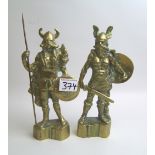 A pair of brass Viking figures: 27cm in height.