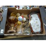 A mixed collection of items to include: brass candlesticks, ethnic figures, brass handled magnifier