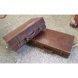 Two vintage brown leather suitcases: